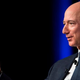 Jeff Bezos demonstrates how he’ll turn the little spaceship knobs during his flight.